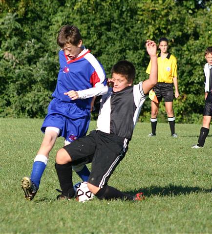 Andy and Ryan playing soccer vs. Delhi Img_8161.jpg (53 k)