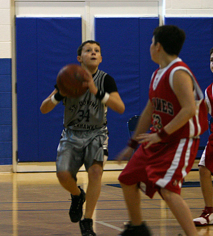 Andy playing basketball vs. Lourdes IMG_7418.jpg (124 k)