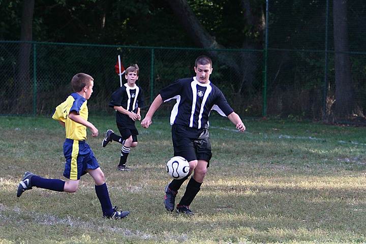 Andrew playing soccer vs. Victory img_1816.jpg (150 k)