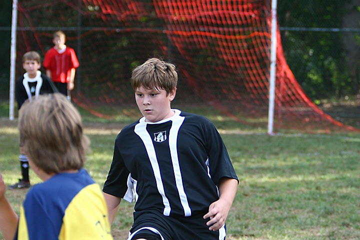 Andrew playing soccer vs. Victory img_1830.jpg (120 k)